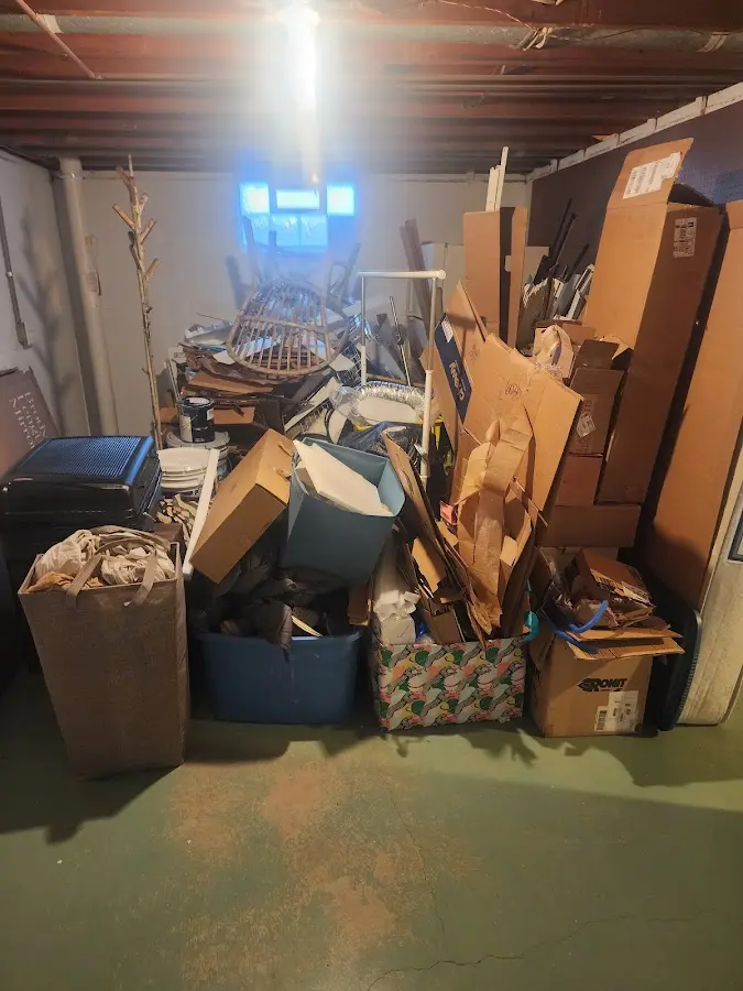 Roll-off dumpster container at job site for Construction Dumpster Rental in Hampton